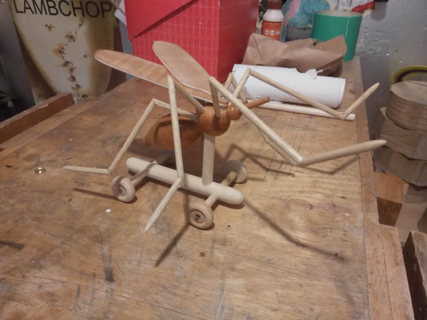 My first wooden mosquito. I made this when my son's (primary) school was having a competition to make vehicles using proscribed wooden wheels, for racing. I was under the impression that parents were also invited to enter and made this 'mosquito-on-wheels' or 'Mos-car-to' as it became known. At the competition it turned out I was the only parent entry! The Mos-car-to was not speedy but I won a certificate for 'Most Creative Design'. Take that, primary school kids! The body is yew.
