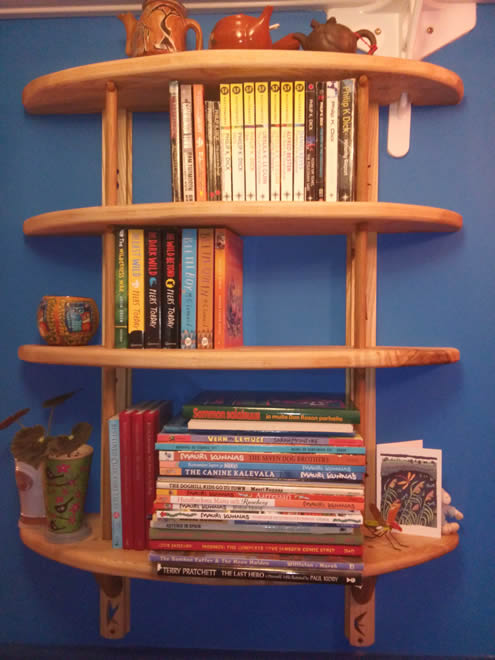 I've made shelves to fit specific spots round the house. This book-shelf is from ash, with oak supporting dowel