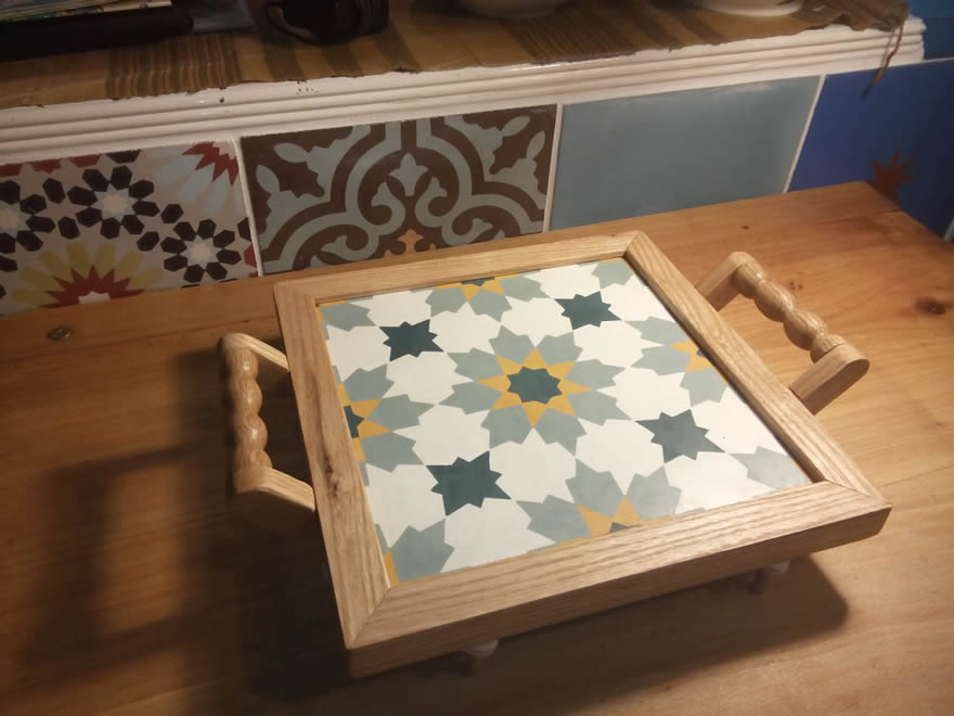I made this trivet from a left-over tile. It turns out to be a good arena for battling spinning top contests!